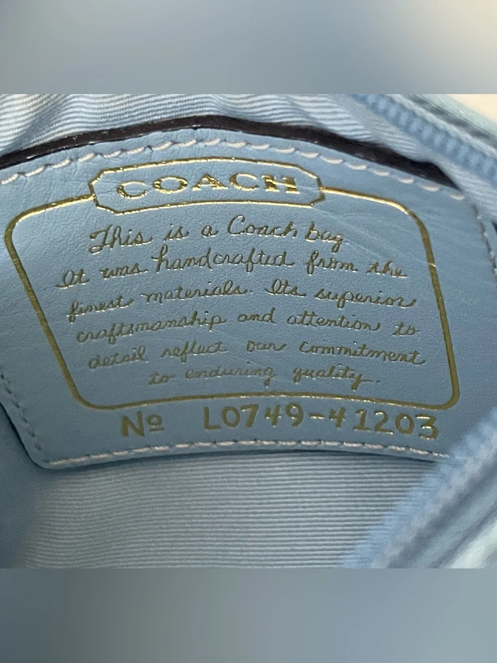 Coach Brown Signature Canvas Wristlet with Blue Trim